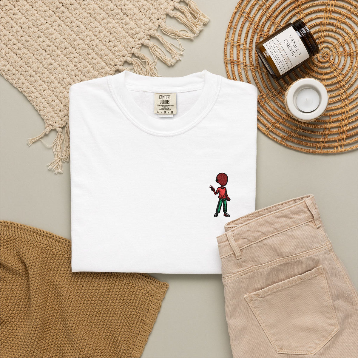 T-Shirt — Tiny Red-Haired Skateboarder Chest Graphic, Minimal Streetwear Tee
